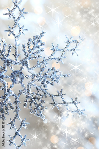 Closeup of snowflake with stars