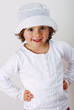 little girl in hat