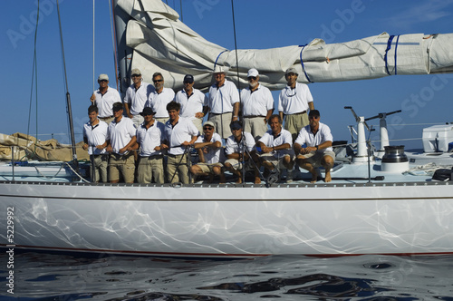 Photo: Crew on Sailboat Deck Before Yacht Race Crew on Sailboat Deck Before Yacht Race