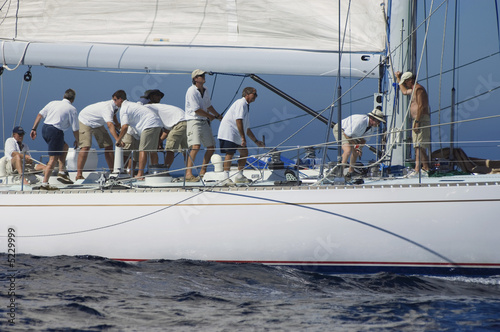 Photo: Sailboat Crew During Race Sailboat Crew During Race