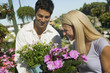 Couple Shopping for flowers in plant nursery