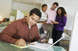 Man Calculating Purchase Amount