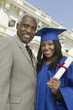 Foto: Graduate with father outside university, portrait Graduate with father outside university, portrait