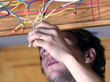 Man Working on wiring Man Working on wiring