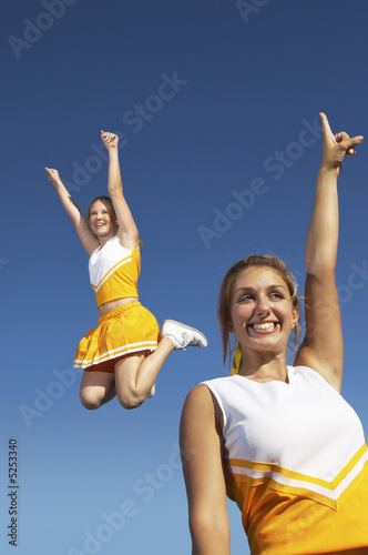 Cheerleader craps mid air