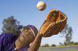 Baseball outfielder catching ball, close-up