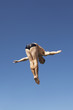 Man diving in pike position, mid air