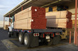 Wood stacked on a truck, rear view