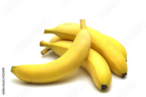 Photo: four banana on white background four banana on white background