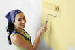 Woman Painting Room Yellow