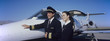 Members of Flight Crew Standing by Airplane