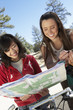 Mountain Bikers with Trail Map