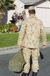 Soldier returning home to family