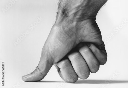 Photo: Thumb Pressing Down Thumb Pressing Down