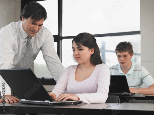Photo: Teenagers in a Computer Lab Teenagers in a Computer Lab