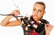 girl in a kimono with colors of an Oriental cherry
