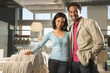 Photo: Couple in retail store. Couple in retail store.