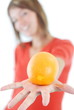 happy girl with orange in hand