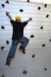 Boy at indoor climbing wall