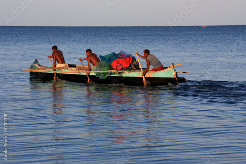 Photo: Malagasy fishermen and their outrigger canoes Malagasy fishermen and their outrigger canoes