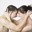 Couple locked in angry embrace