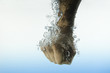 Male Fist Hits Water