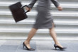 Photo: Businesswoman walking quickly, low section Businesswoman walking quickly, low section