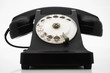 Old fashioned black telephone in studio