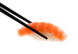Sushi with chopsticks shot on white. Sushi with chopsticks shot on white.