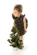 The little girl with a Christmas tree The little girl with a Christmas tree