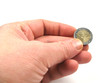 two euro coin in hand