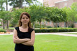 Foto: female college student with arms crossed female college student with arms crossed
