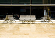 Empty seating at the airport departure area Empty seating at the airport departure area