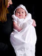 baby girl in a christening dress 