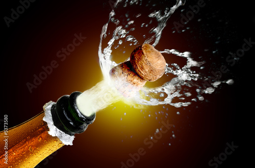 Close up of champagne cork popping