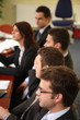 business people at the debate