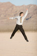 Happy businessman jumping in air Happy businessman jumping in air