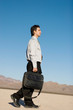 Businessman carrying his laptop case Businessman carrying his laptop case