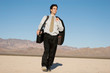 Businessman carrying his laptop case Businessman carrying his laptop case