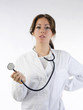 cute brunette in white medical gown   and a stethoscope