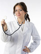 cute brunette in white medical gown   and a stethoscope