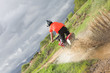 Photo: Young man riding around on his dirtbike doing tricks Young man riding around on his dirtbike doing tricks