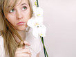 Close up of beautiful woman with white orchid
