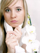 Close up of beautiful woman with white towel on the neck