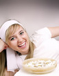 Close up of beautiful woman with bowl of daisies
