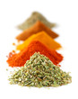 Heaps of various ground spices on white background Heaps of various ground spices on white background