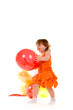 happy girl playing with colorful balloons