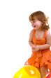 happy girl playing with colorful balloons