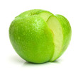 Ripe apple of green color with the segment cut out from it