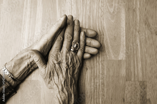 Old hands on clean table
